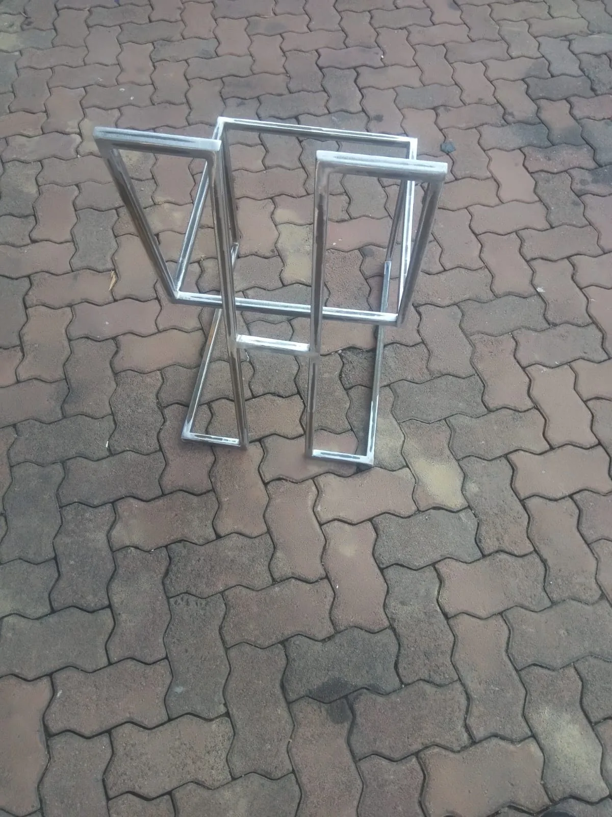 Polished stainless steel table base